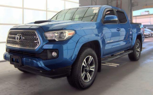 Blazing Blue Pearl 2017 Toyota Tacoma Pickup Truck Four-Wheel Drive Automatic