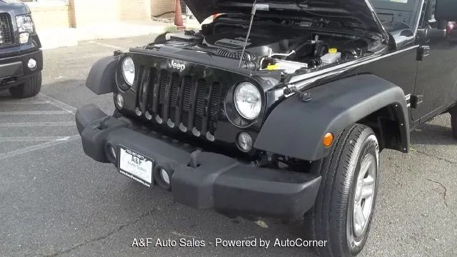 2015 Jeep Wrangler Sport — photo 12 of 24
