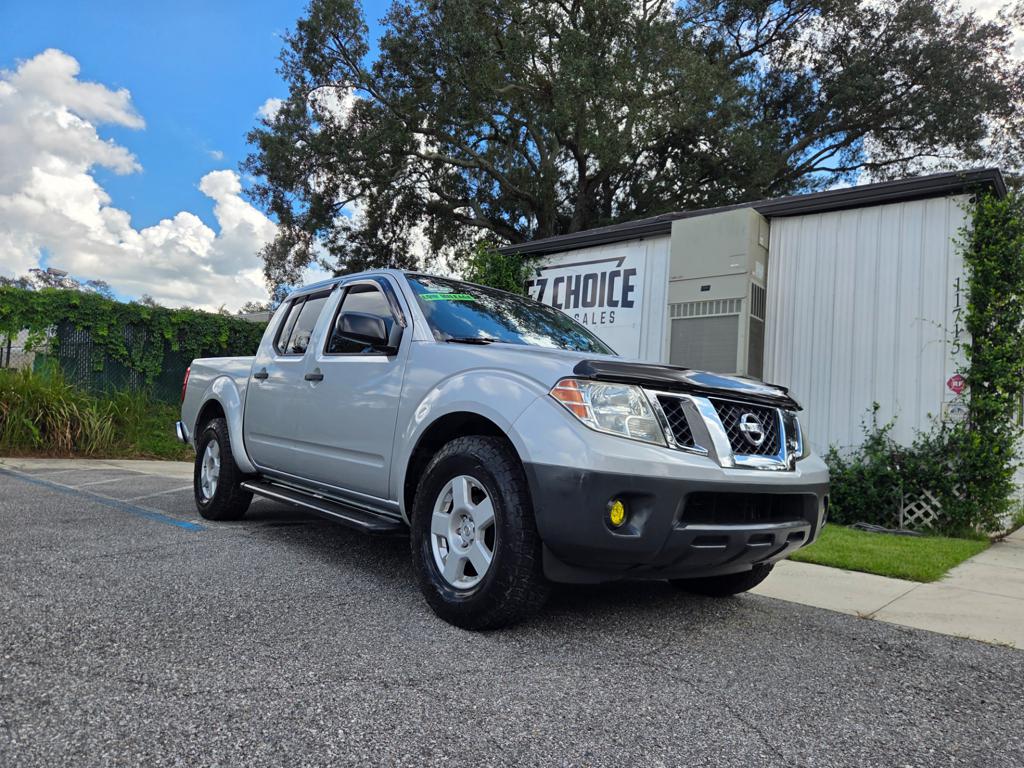 Silver 2014 Nissan Frontier Pickup Truck 4X2 5-Speed Automatic