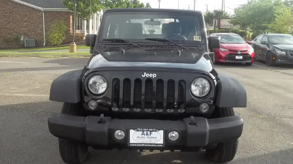 2015 Jeep Wrangler Sport — photo 14 of 24