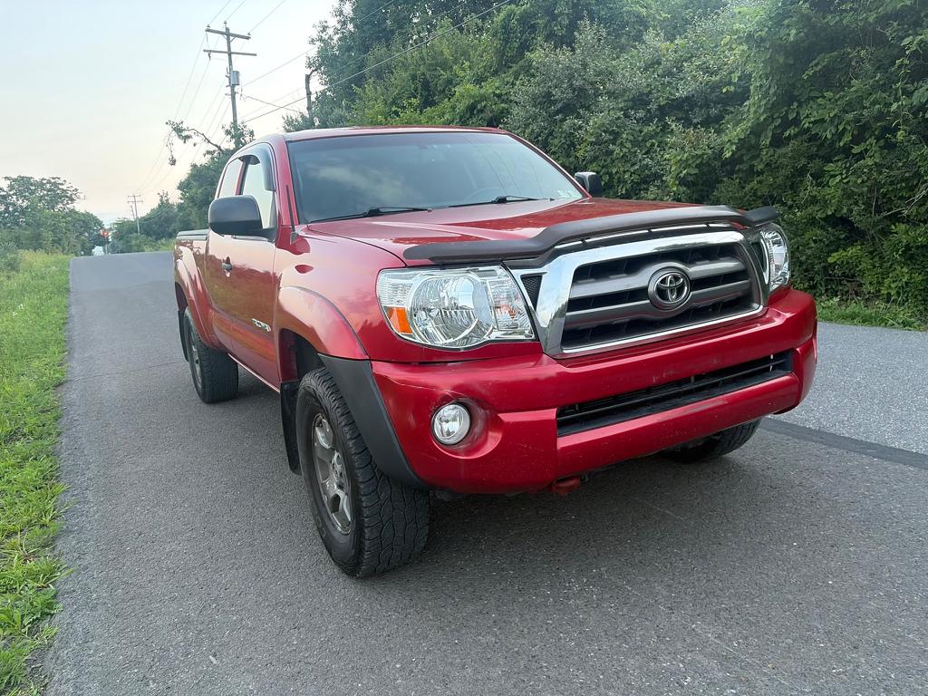 Red 2010 Toyota Tacoma Pickup Truck Four-Wheel Drive Automatic