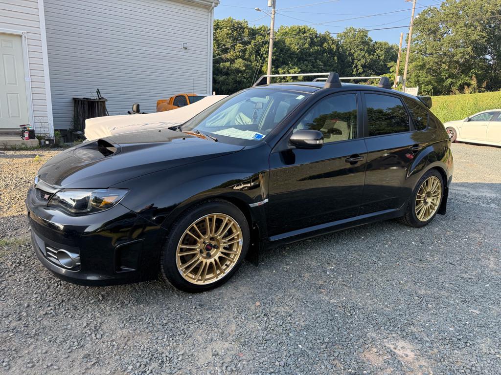 Black 2009 Subaru Impreza WRX STI Wagon All-Wheel Drive 6-Speed Manual