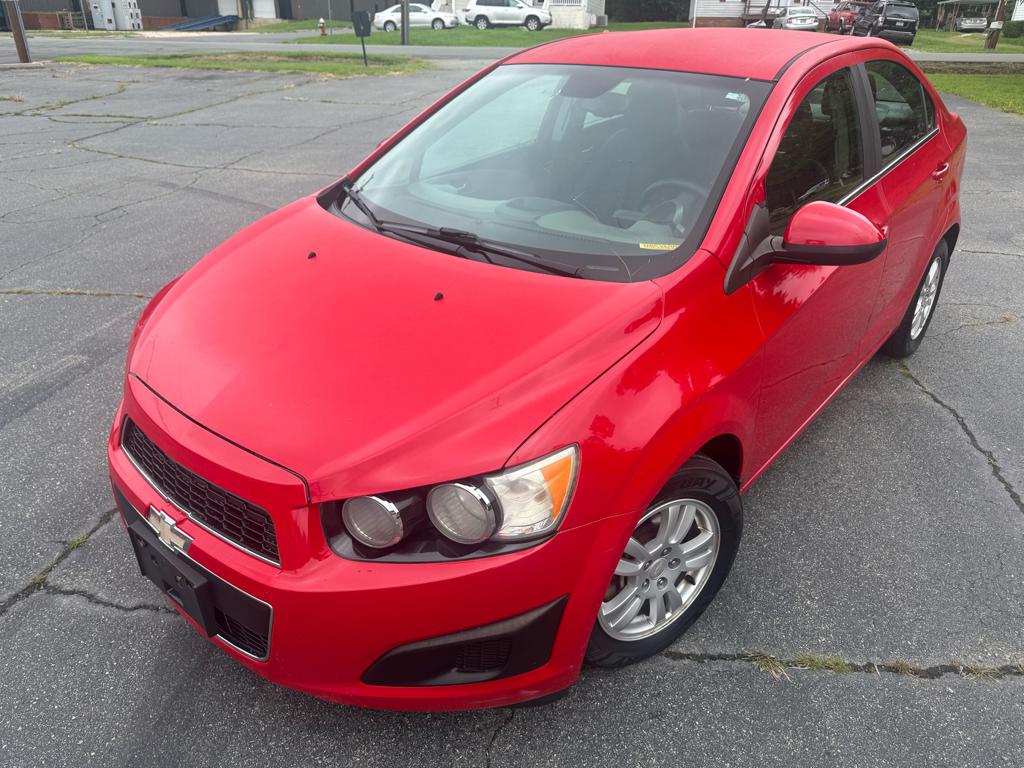 Red 2013 Chevrolet Sonic Sedan Front-Wheel Drive 6-Speed Automatic