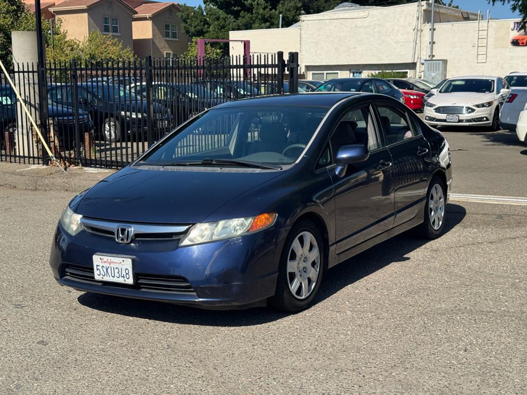 Blue 2006 Honda Civic LX Sedan Front-Wheel Drive 5-Speed Automatic