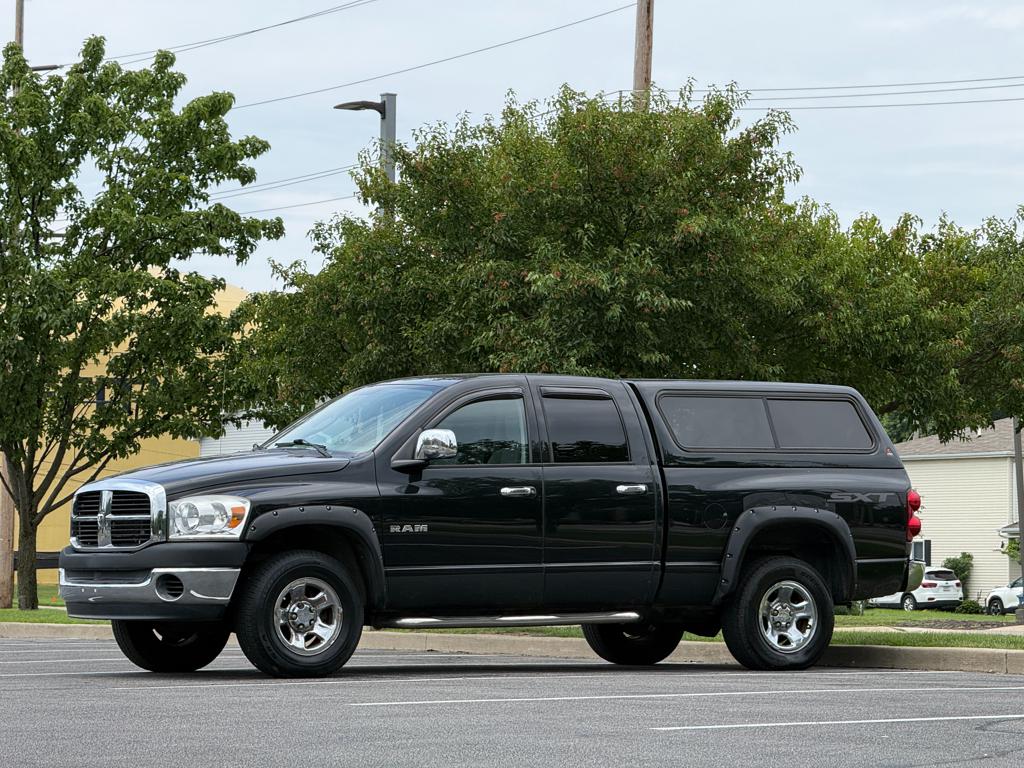 Black 2008 Dodge RAM 1500 Pickup Truck Four-Wheel Drive 5-Speed Automatic