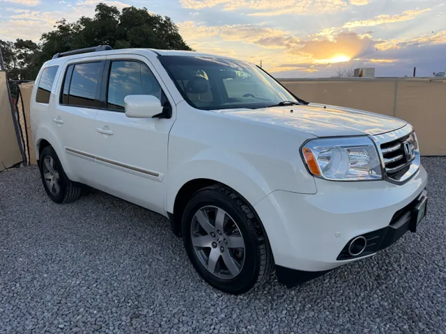 2014 Honda Pilot 4WD Touring w/RES & Navigation's photo